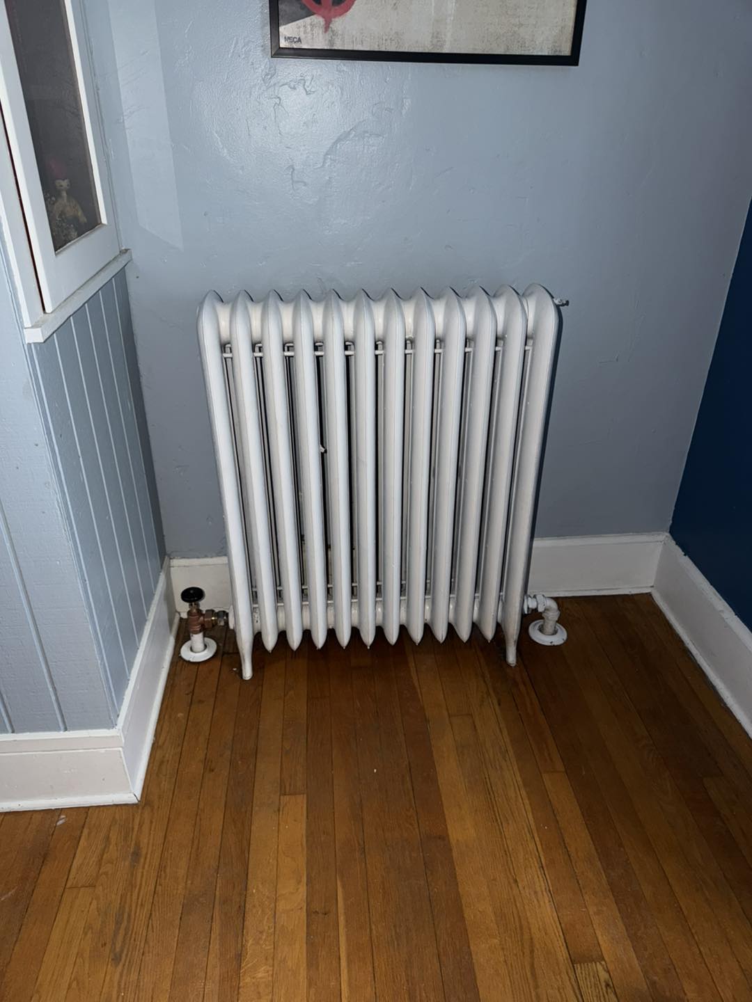 Freshly restored and installed cast iron radiator