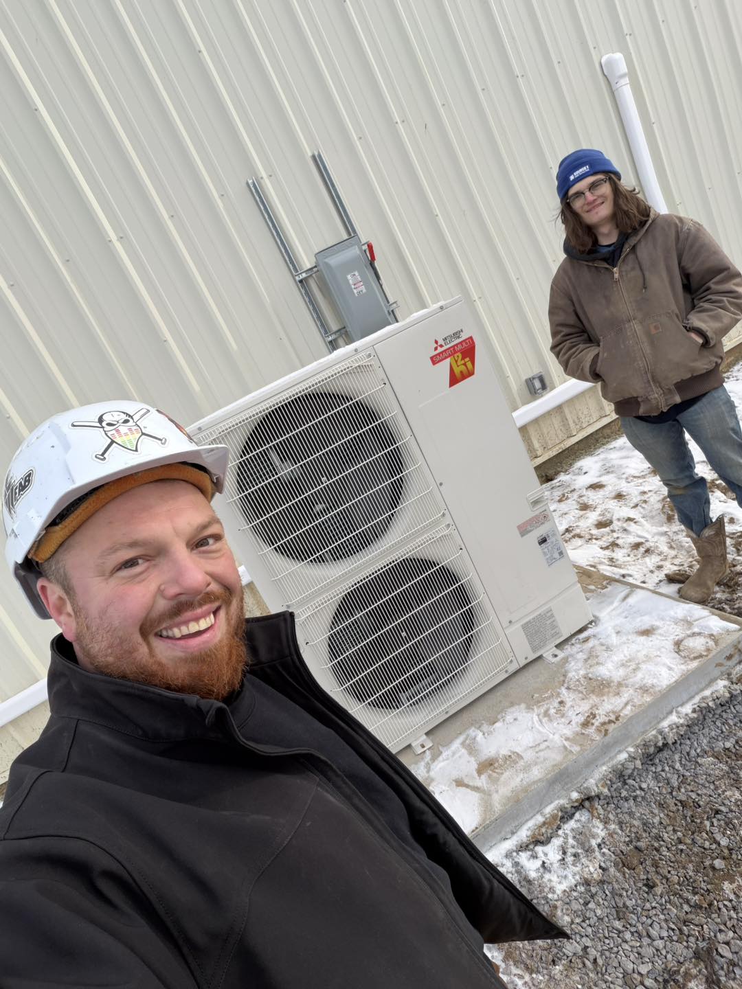 Heath and Todd Sprout on the job — Mitsubishi heat pump installation
